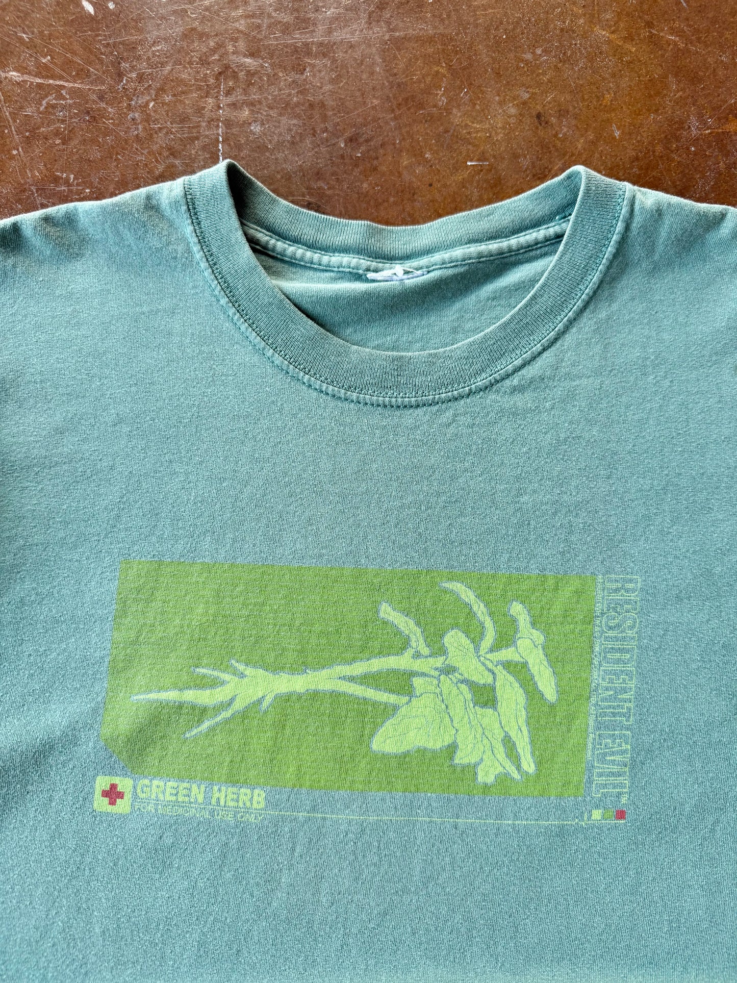 2000s Resident Evil "green herb" shirt (XL)