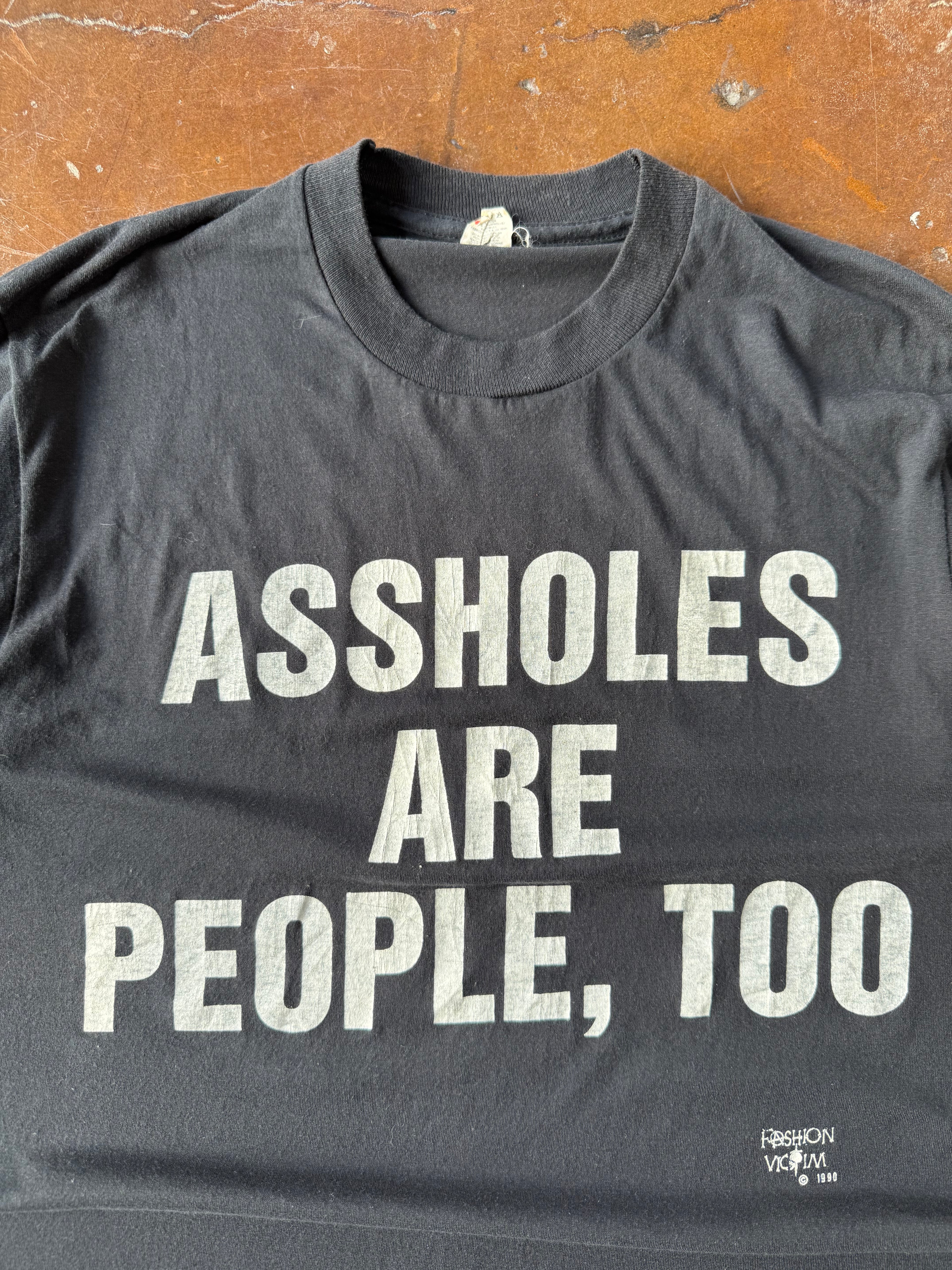 1990 Fashion Victim "assholes are people, too" quote shirt (LARGE)
