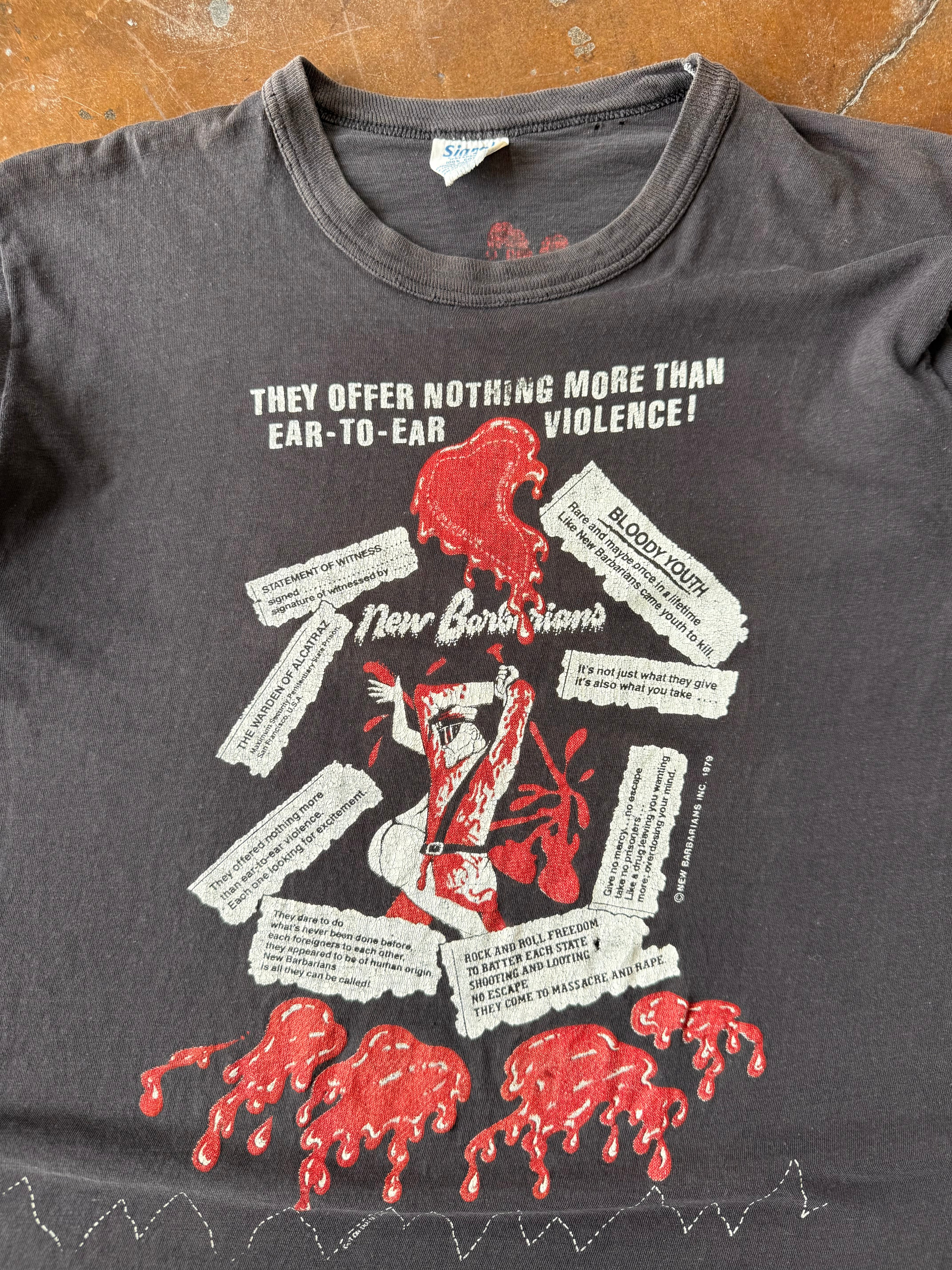 1979 New Barbarians "ear-to-ear violence" band shirt (LARGE)