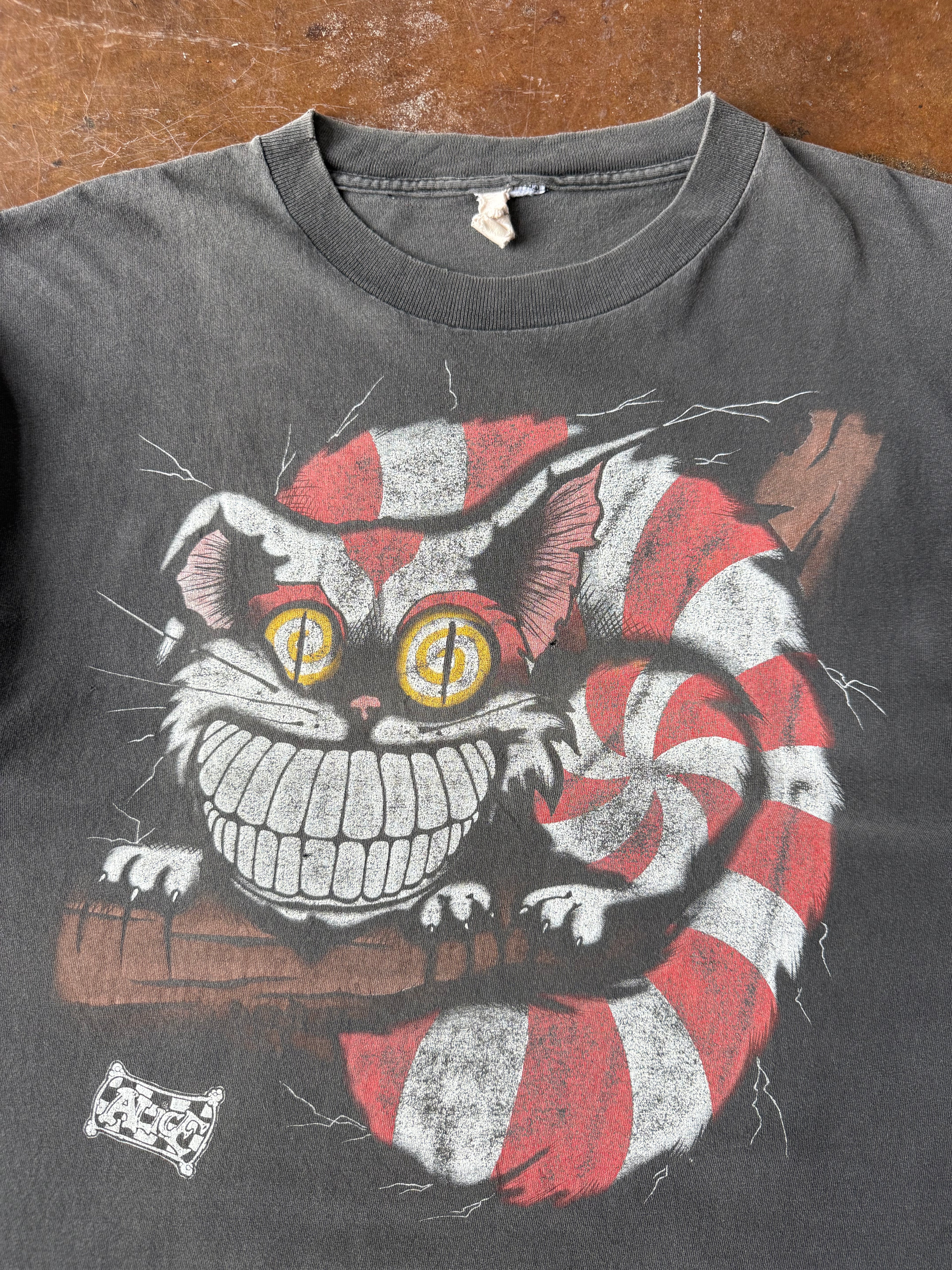90s lightly faded Alice in Wonderland "cheshire cat" shirt (XL)