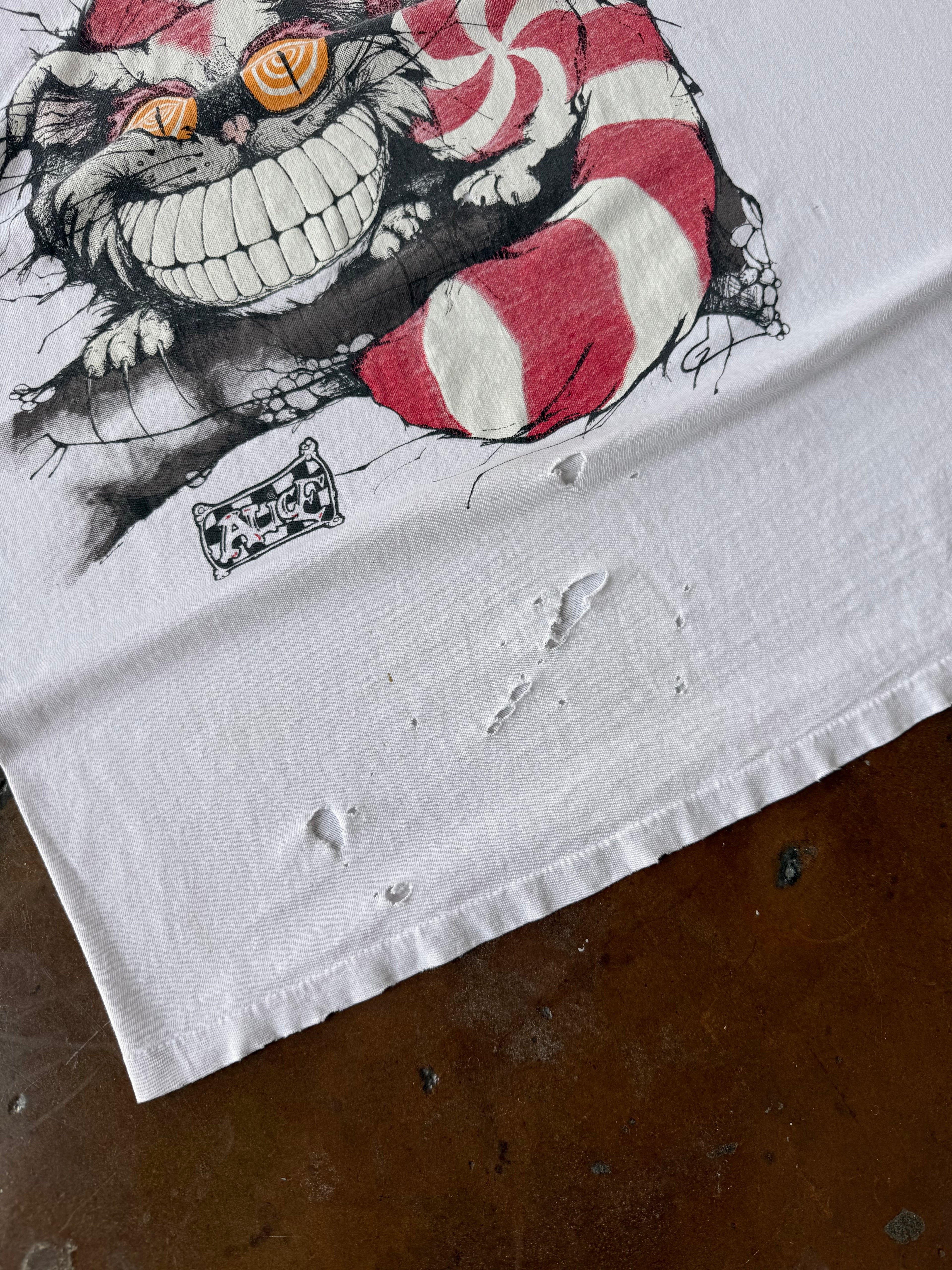 90s distressed Alice in Wonderland "cheshire cat" shirt (XL)