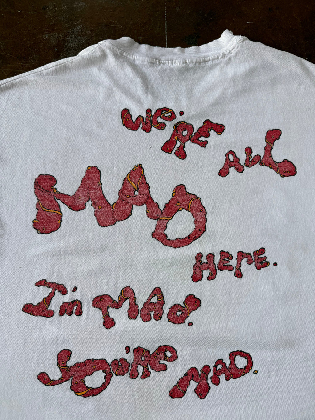 90s distressed Alice in Wonderland "cheshire cat" shirt (XL)
