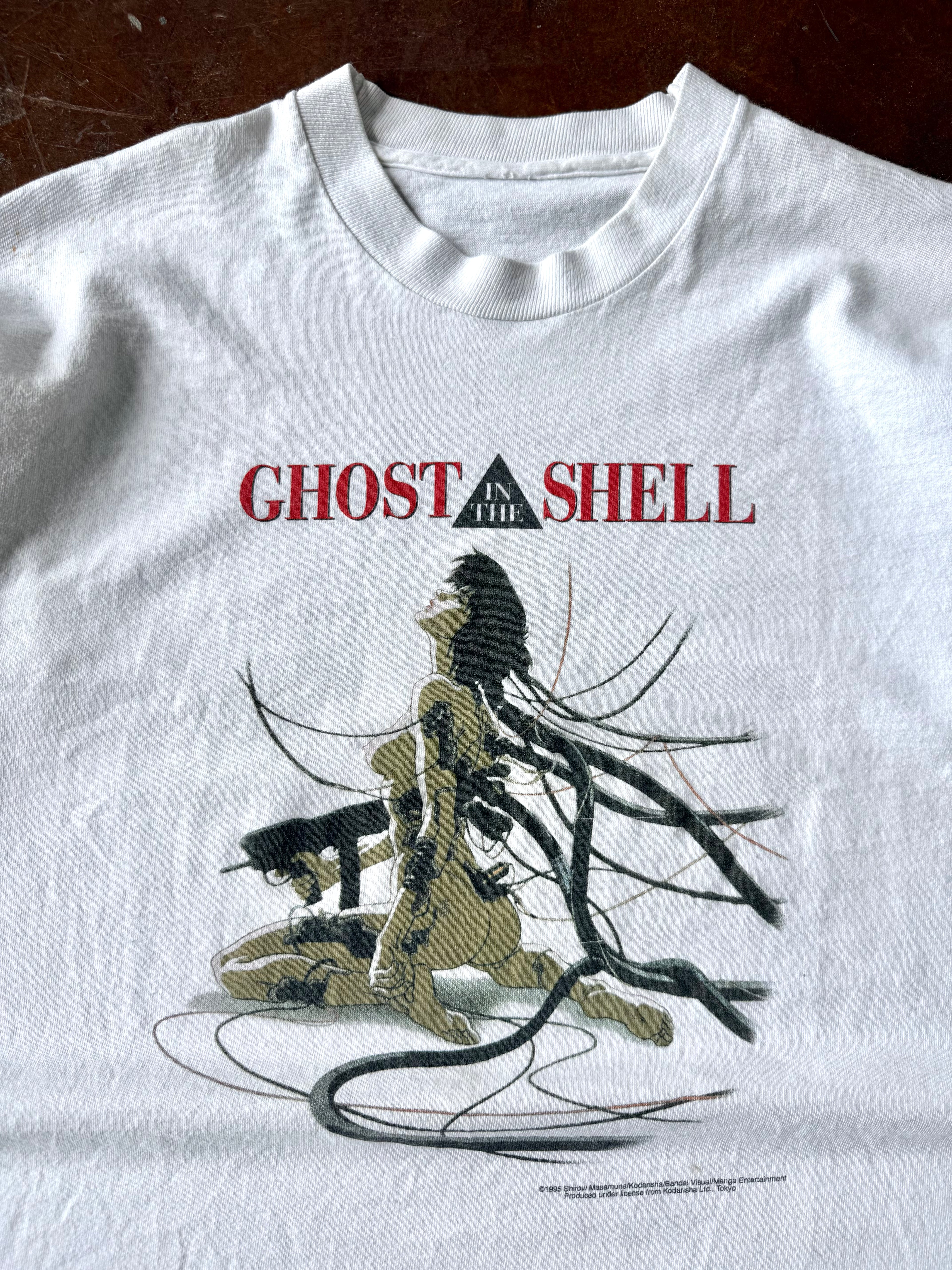 1995 Ghost in the Shell "people love machines in 2029 A.D." anime shirt (LARGE)