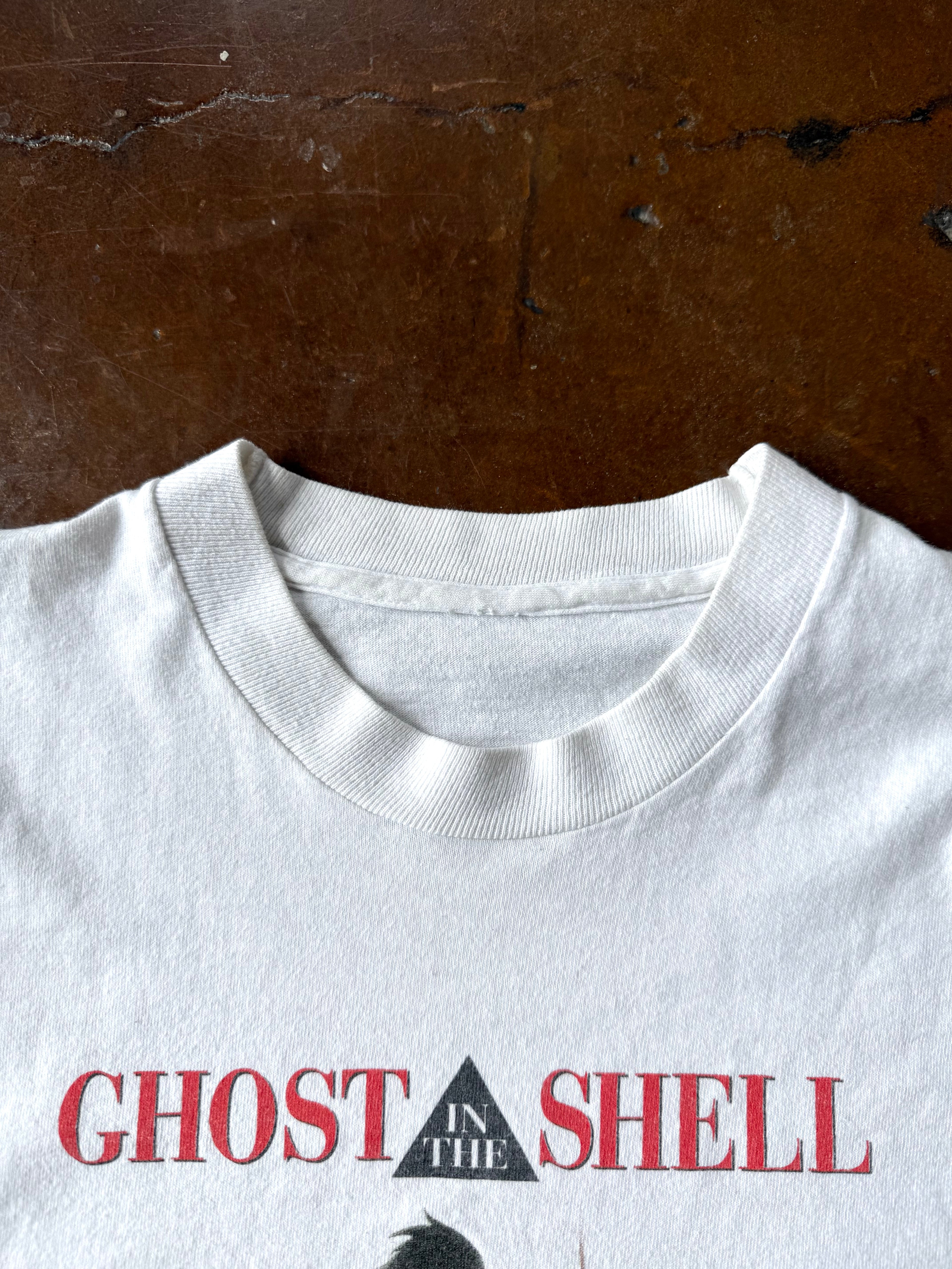 1995 Ghost in the Shell "people love machines in 2029 A.D." anime shirt (LARGE)