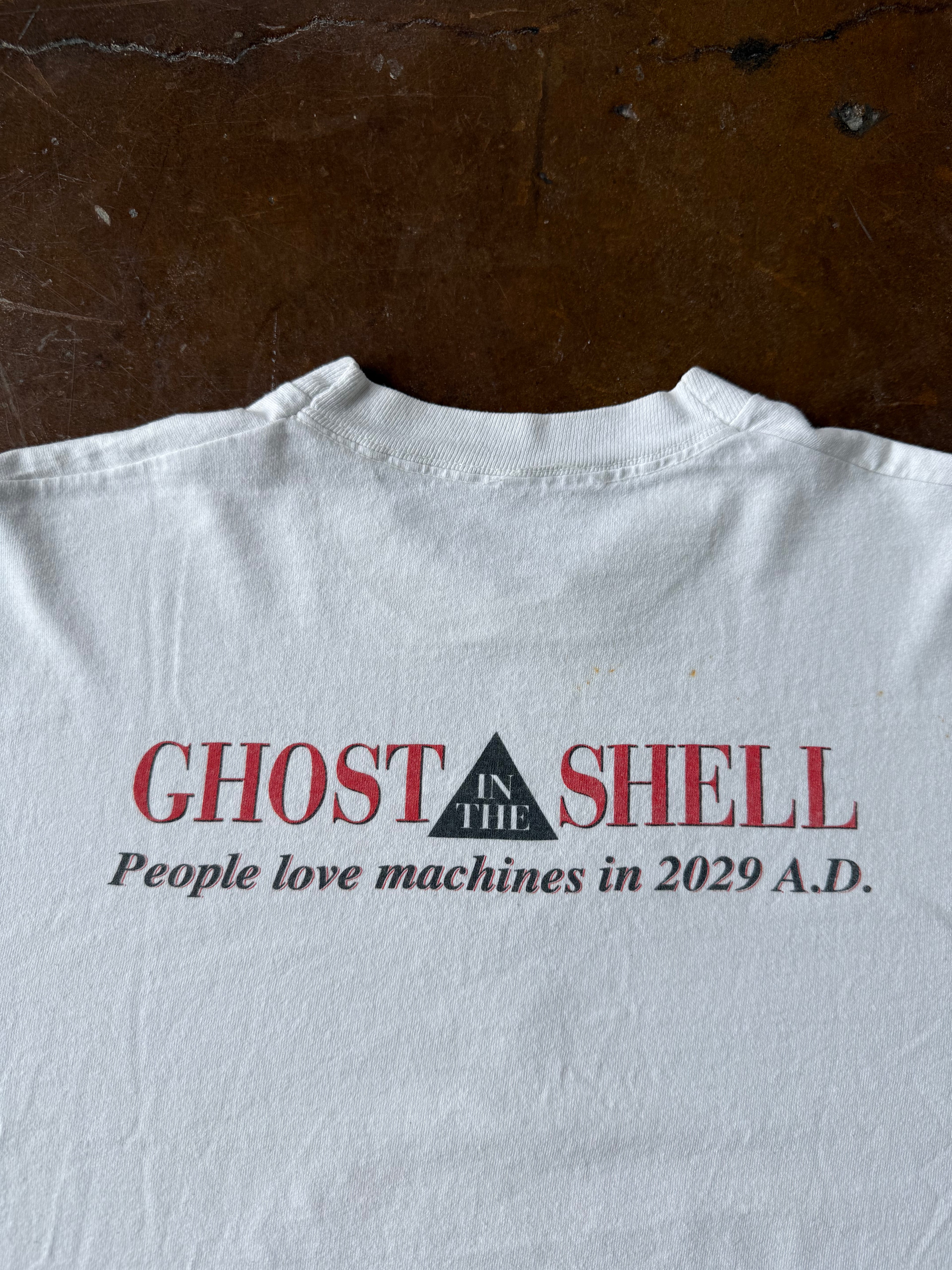 1995 Ghost in the Shell "people love machines in 2029 A.D." anime shirt (LARGE)