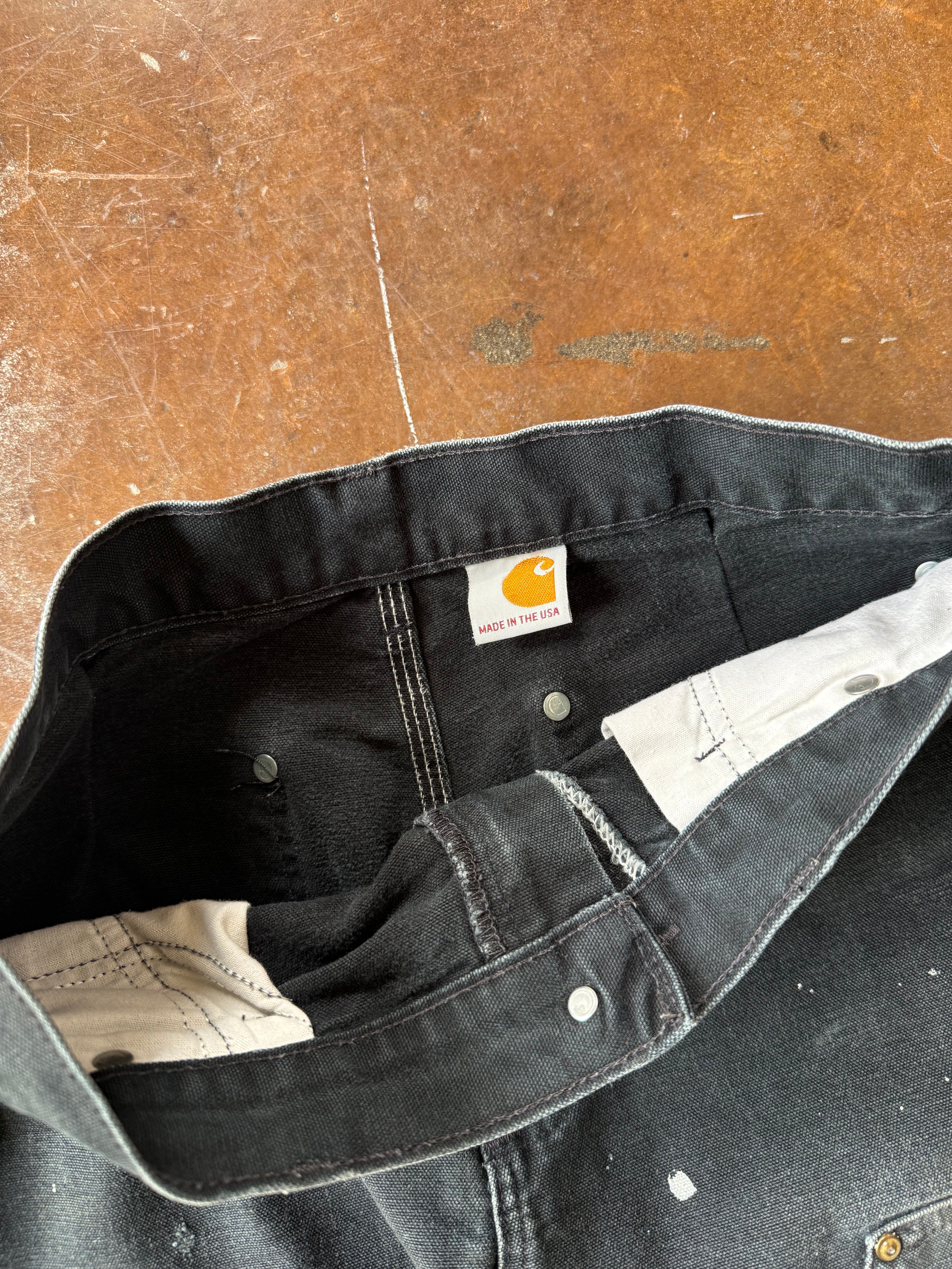 90s faded & distressed Carhartt Capri shorts (30 x 17)