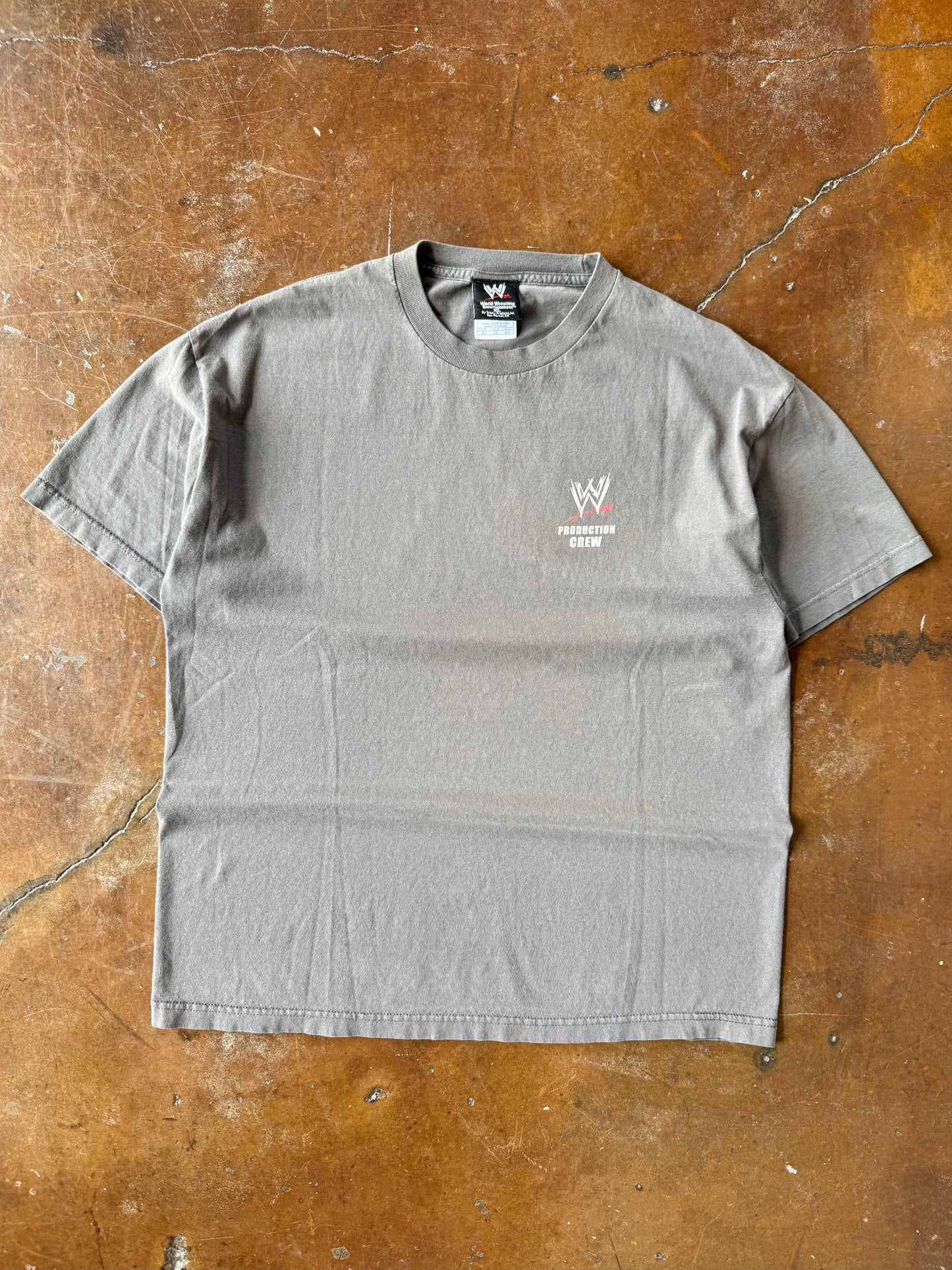 2004 lightly faded WWE production team "road that never ends" shirt (XL)