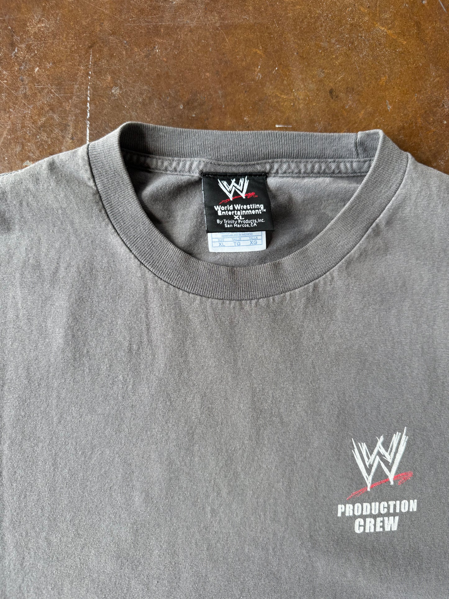 2004 lightly faded WWE production team "road that never ends" shirt (XL)