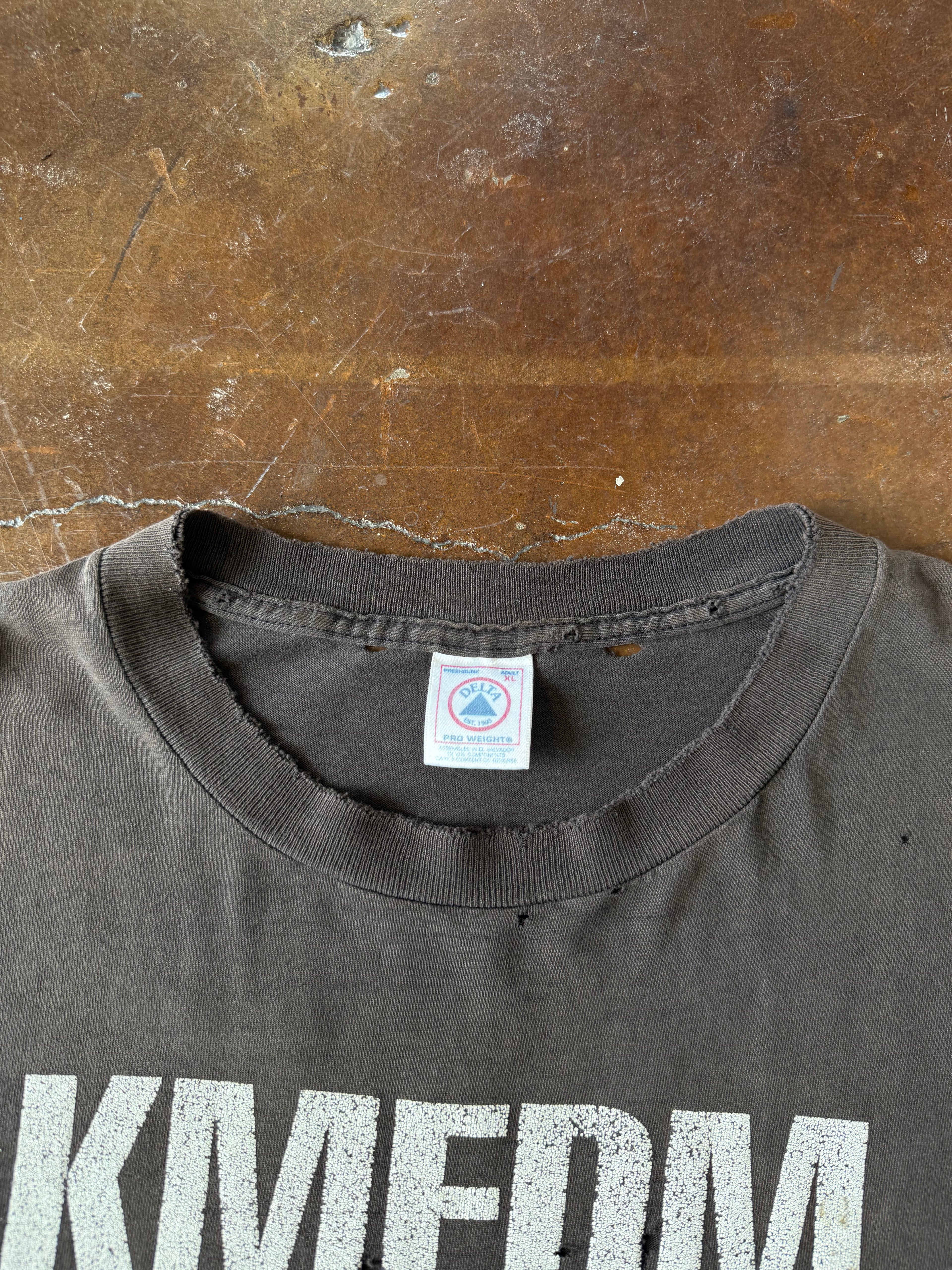 90s lightly faded & distressed KMFDM "drug against war" band shirt (XL)